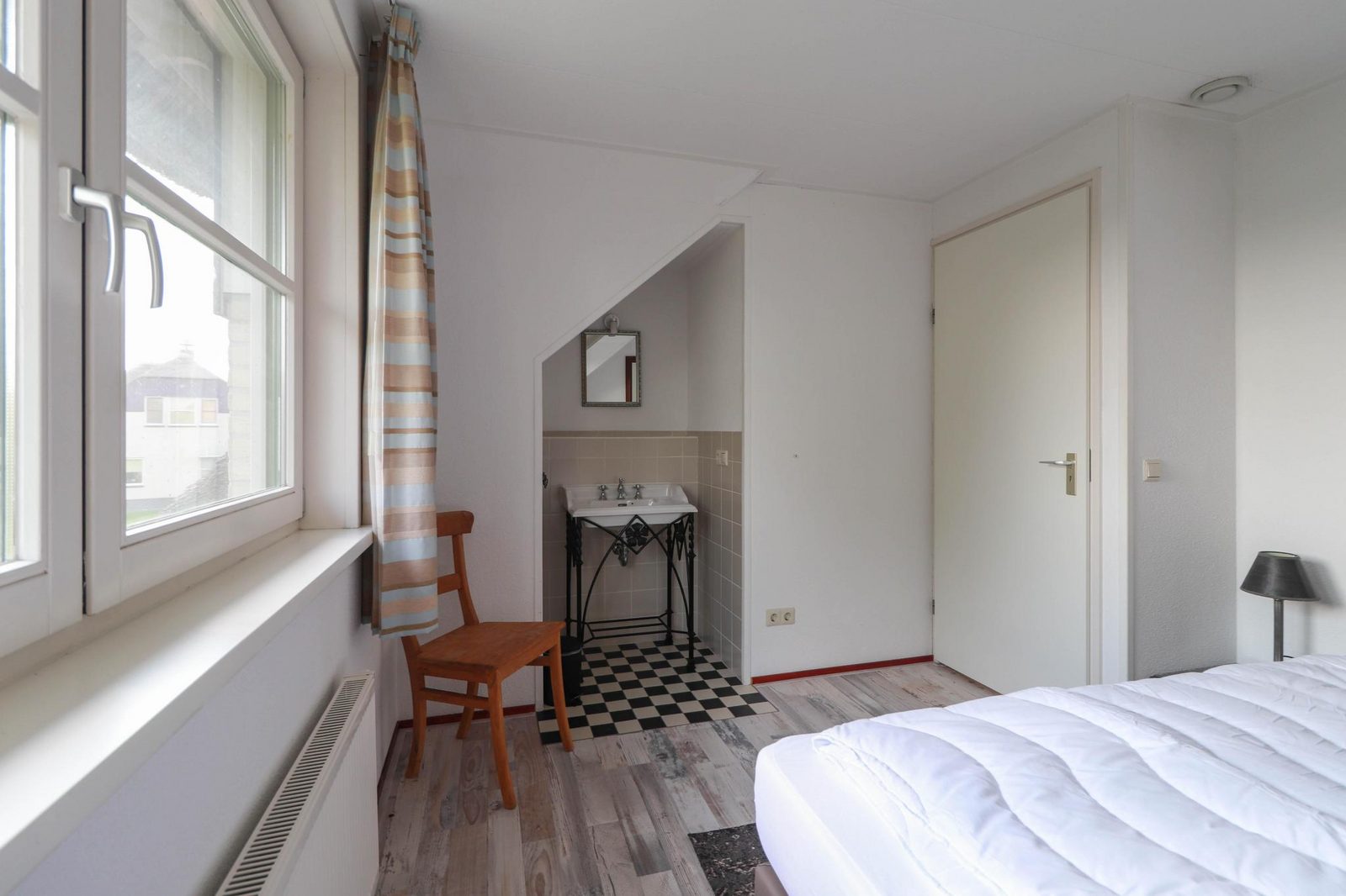 Slaapkamer met comfortabel bed in Scheurrak 7